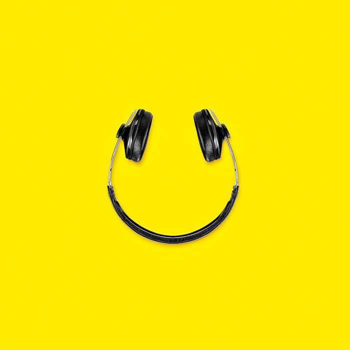 Consumerism culture mocked by Tony Futura headphones smiley