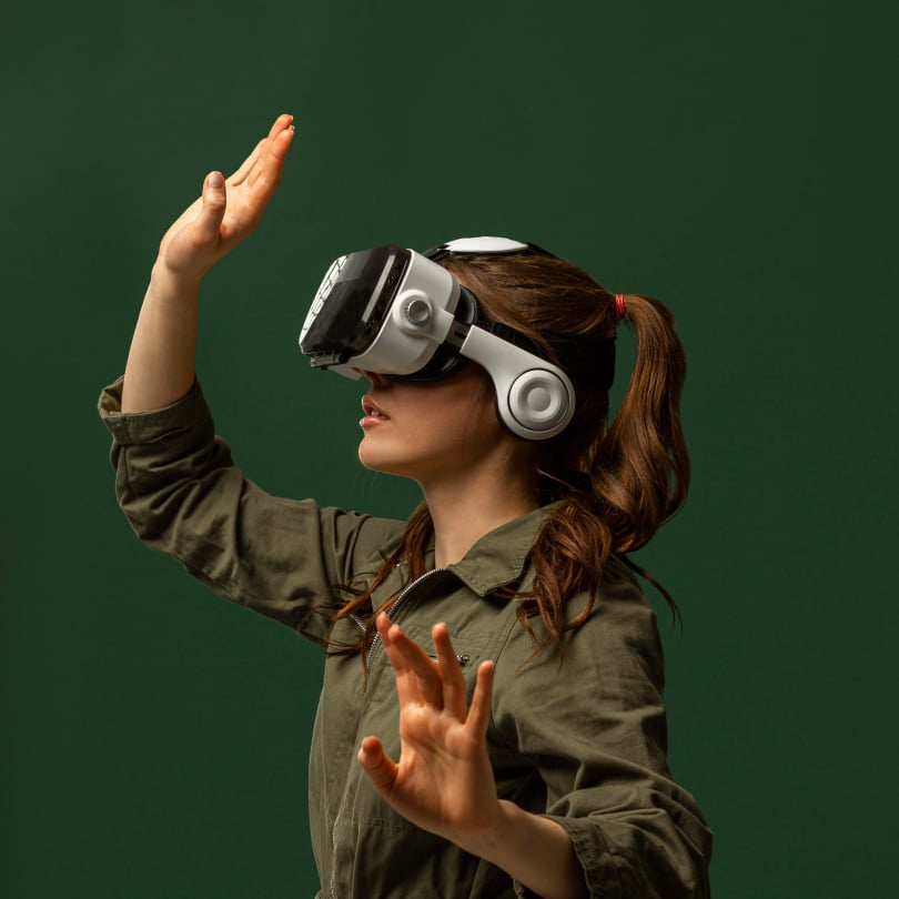 Women wearing VR headset.